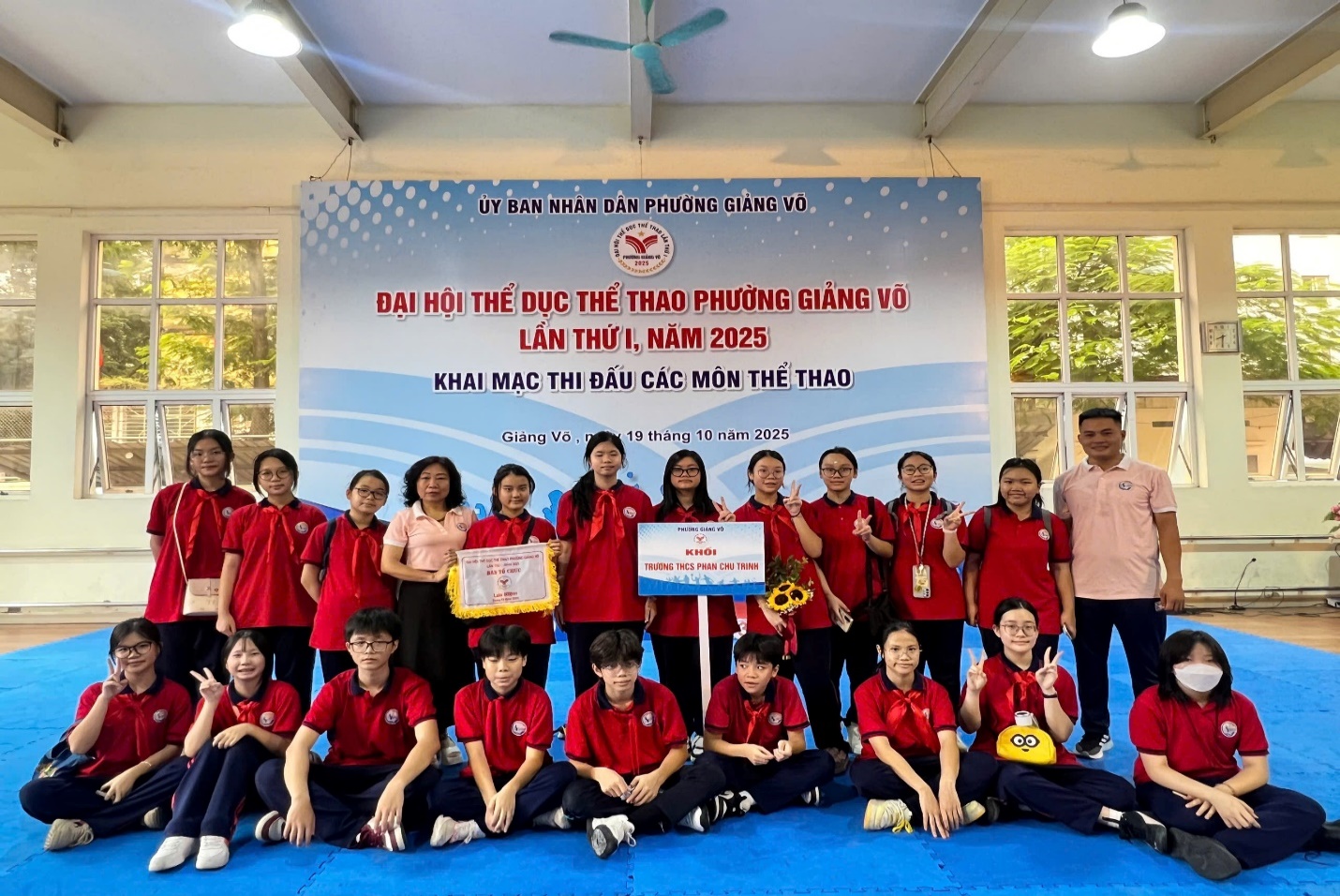 A group of people posing for a photo
AI-generated content may be incorrect.