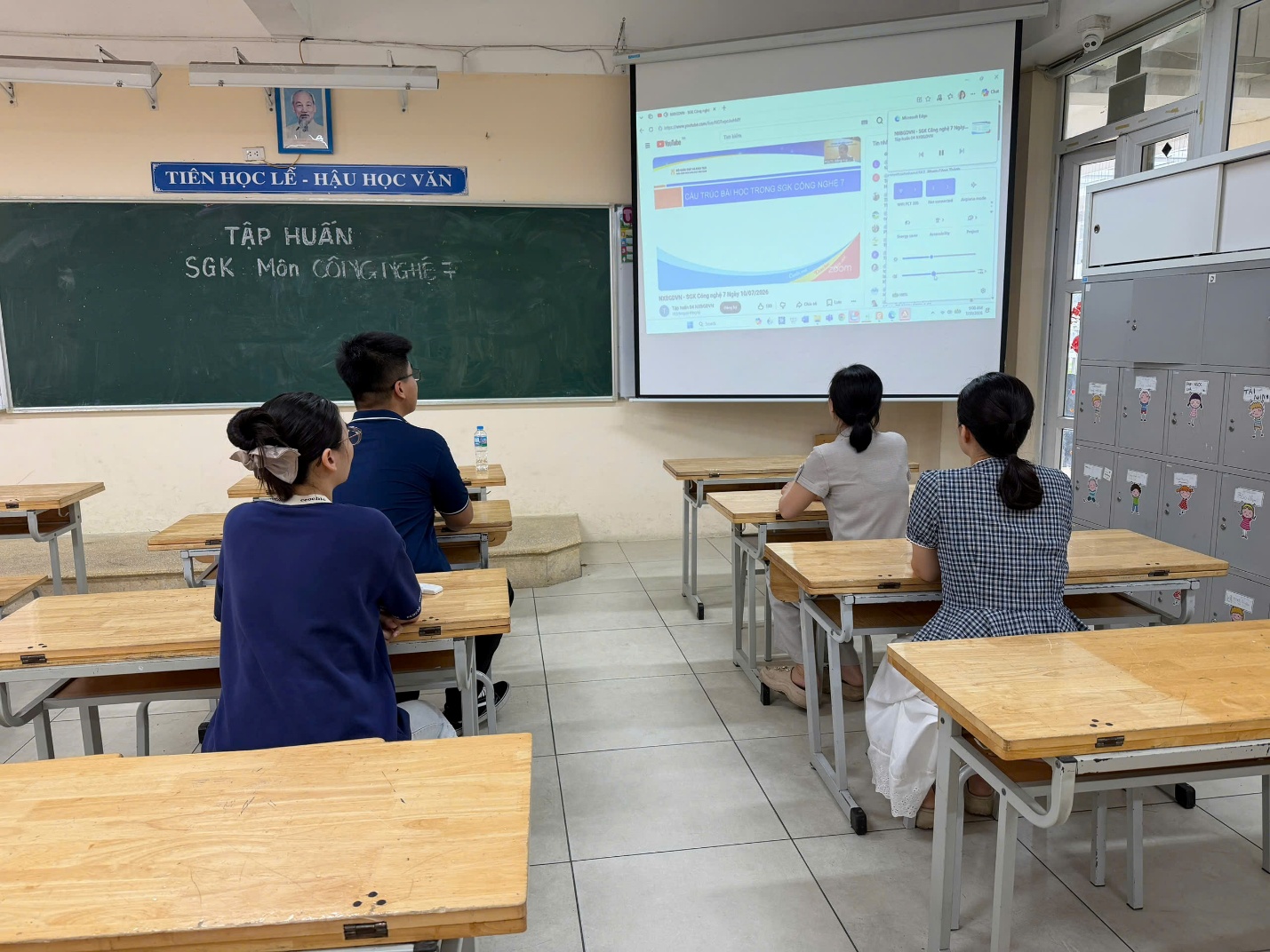 A group of people sitting at desks in a classroom

AI-generated content may be incorrect.