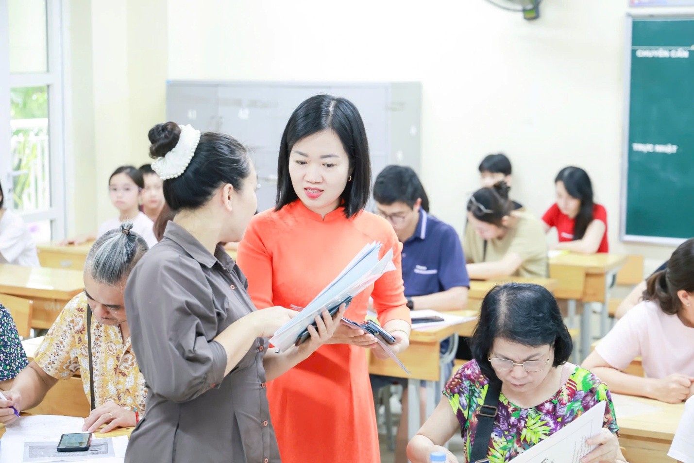 A group of people in a classroom
