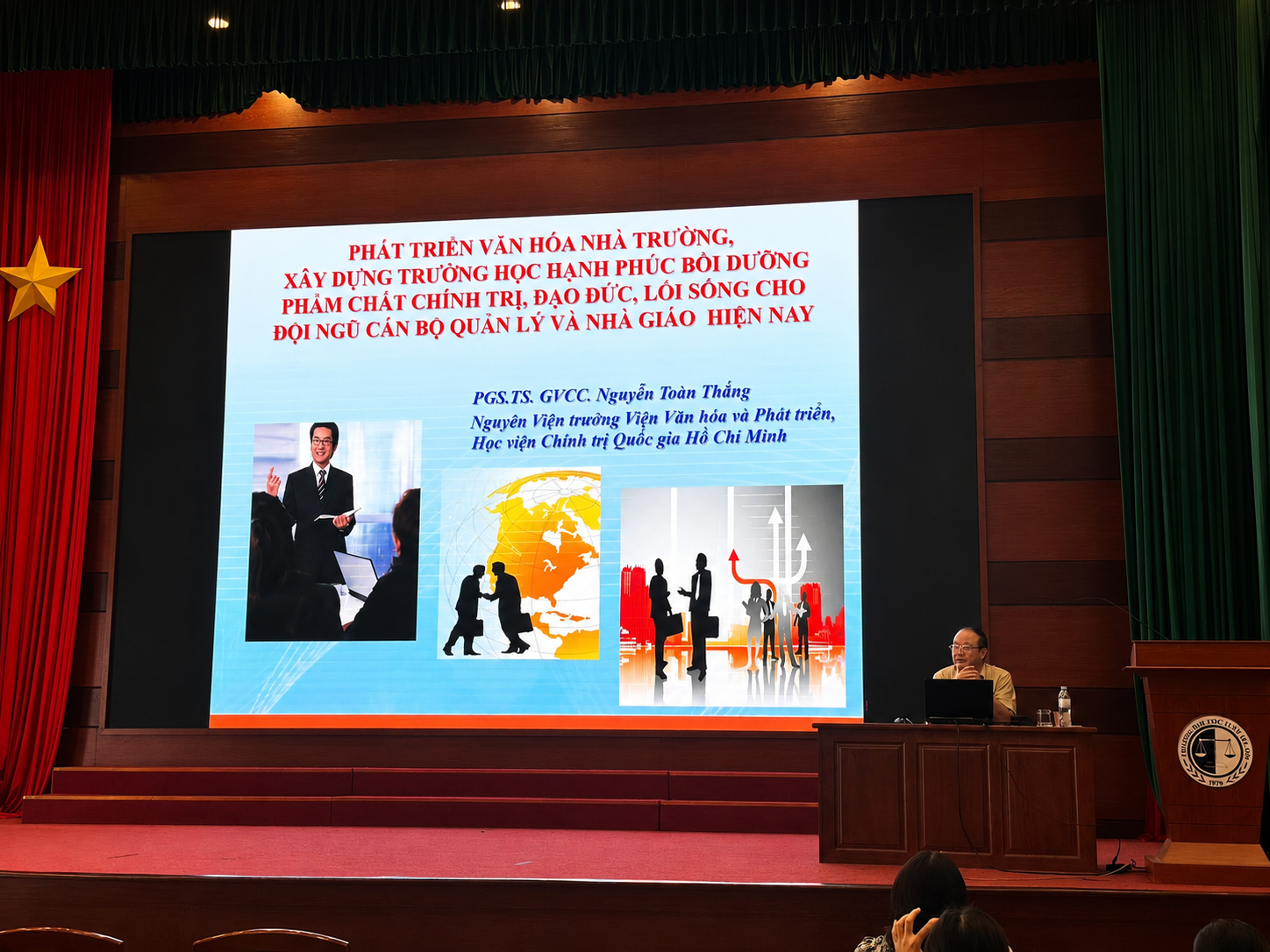 A person standing in front of a large screen

AI-generated content may be incorrect.