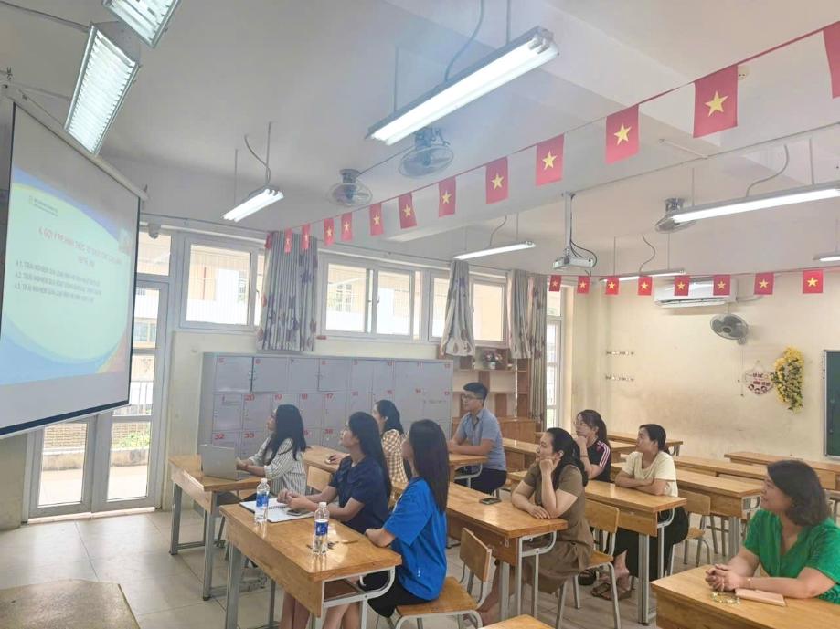 A group of people sitting at desks in a classroom

AI-generated content may be incorrect.